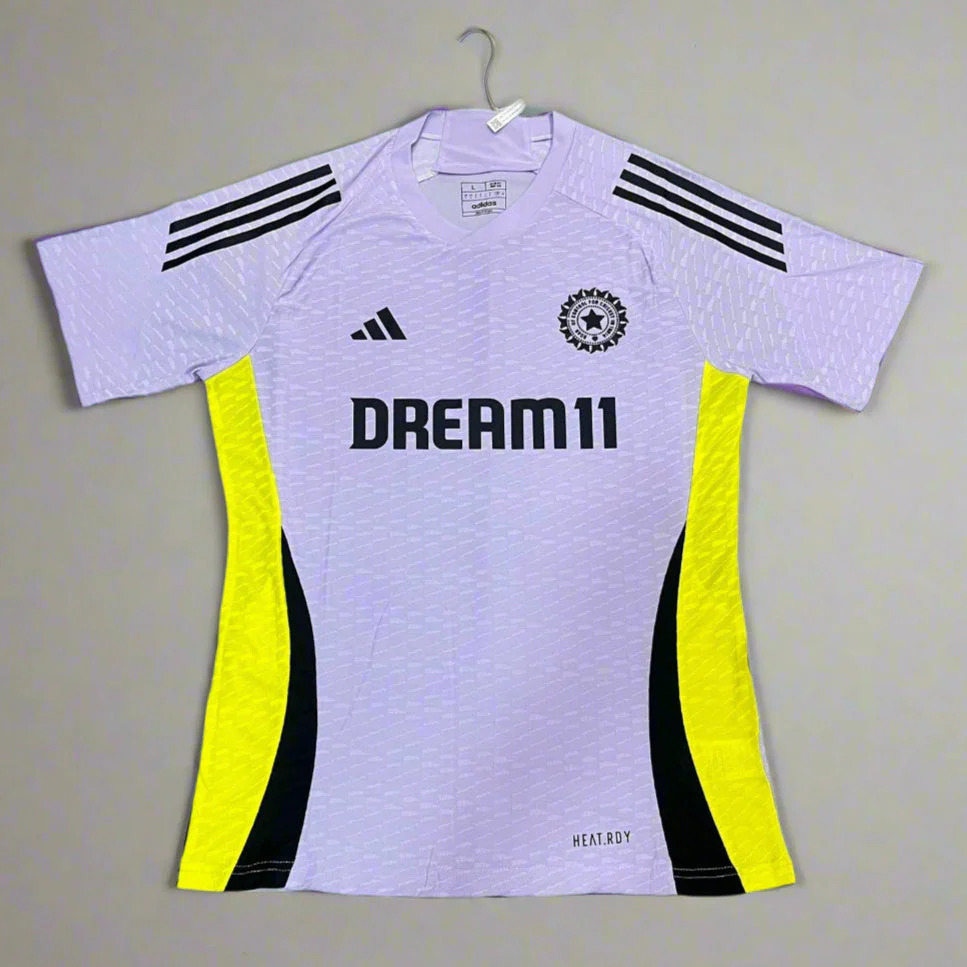 India cricket team jersey with black stripes, yellow side panels, Adidas logo, and “DREAM11” printed on the front. 